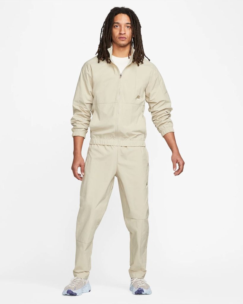 pantaloni nike uomo lunghi tessuto beige