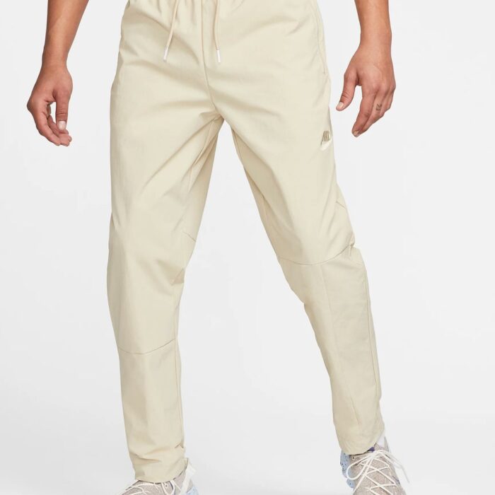 pantaloni nike uomo lunghi tessuto beige