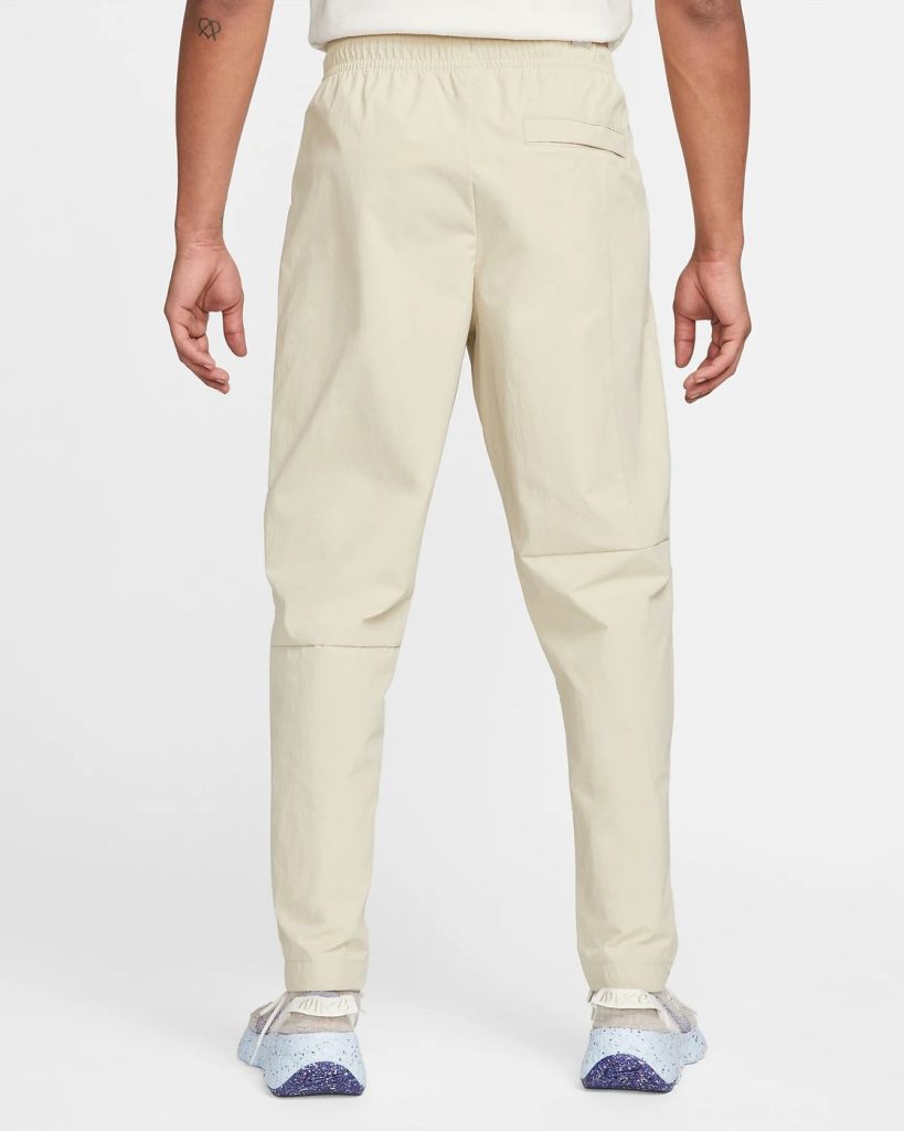 pantaloni nike uomo lunghi tessuto beige